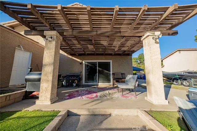 a view of a porch with seating space