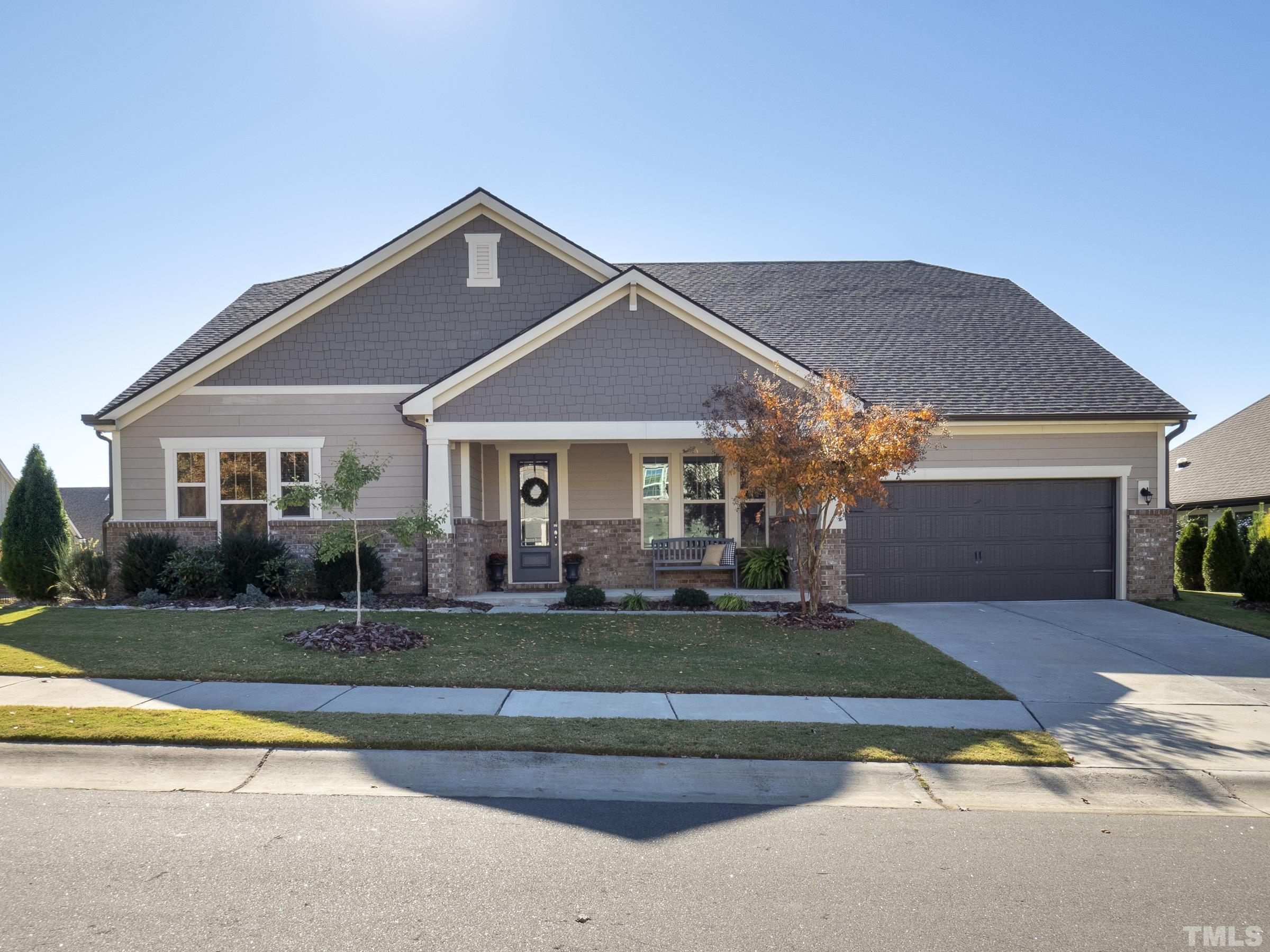 1303 Capstone Drive Durham, NC 27713 - Photo 1 of 27 a front view of a house with a yard