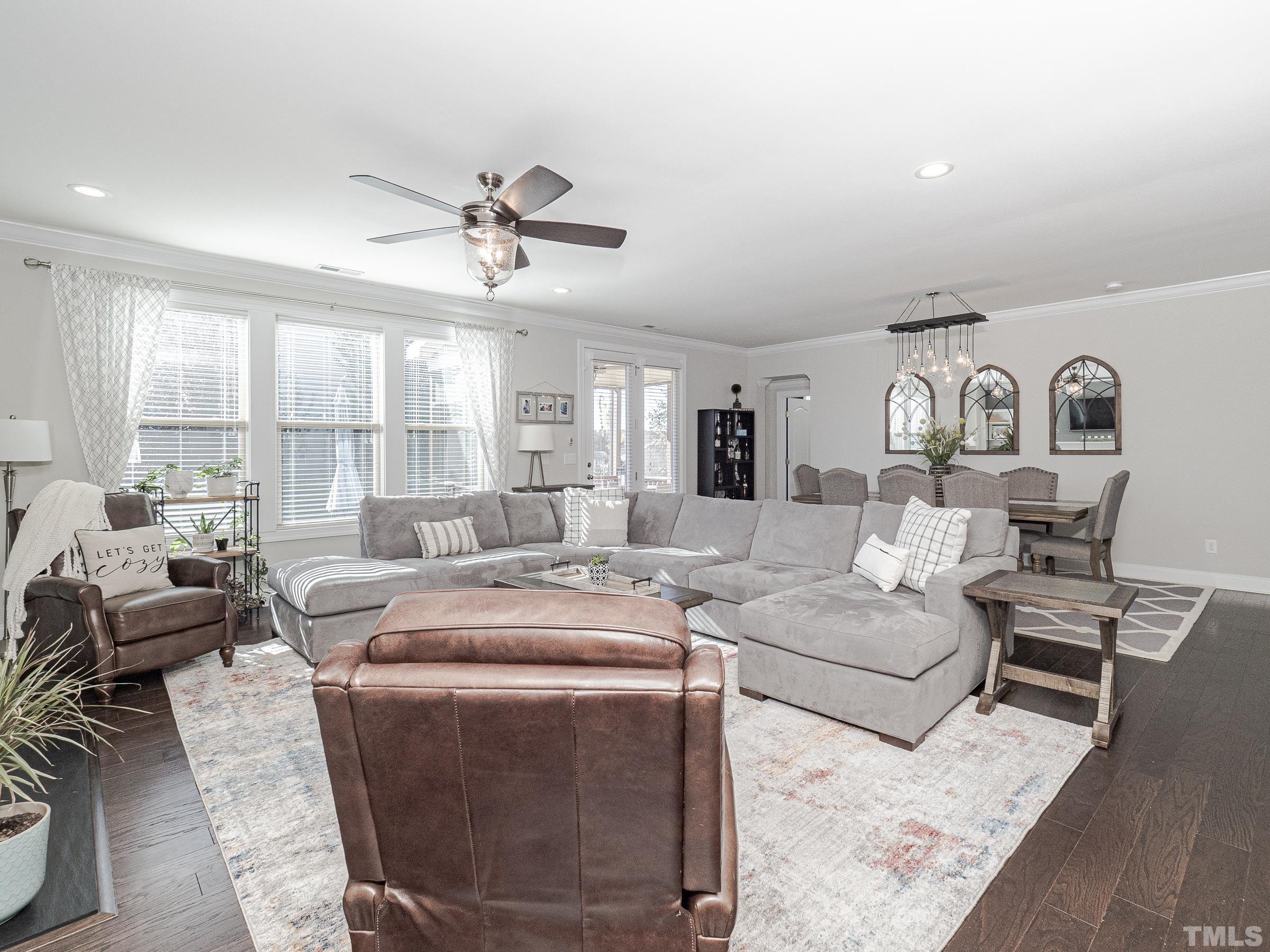 1303 Capstone Drive Durham, NC 27713 - Photo 11 of 27 a living room with furniture and a large window