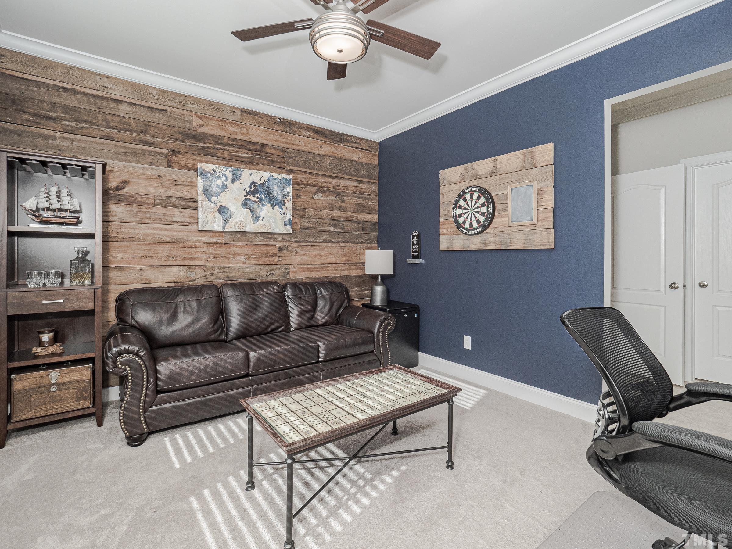 1303 Capstone Drive Durham, NC 27713 - Photo 17 of 27 a living room with furniture and a dining table
