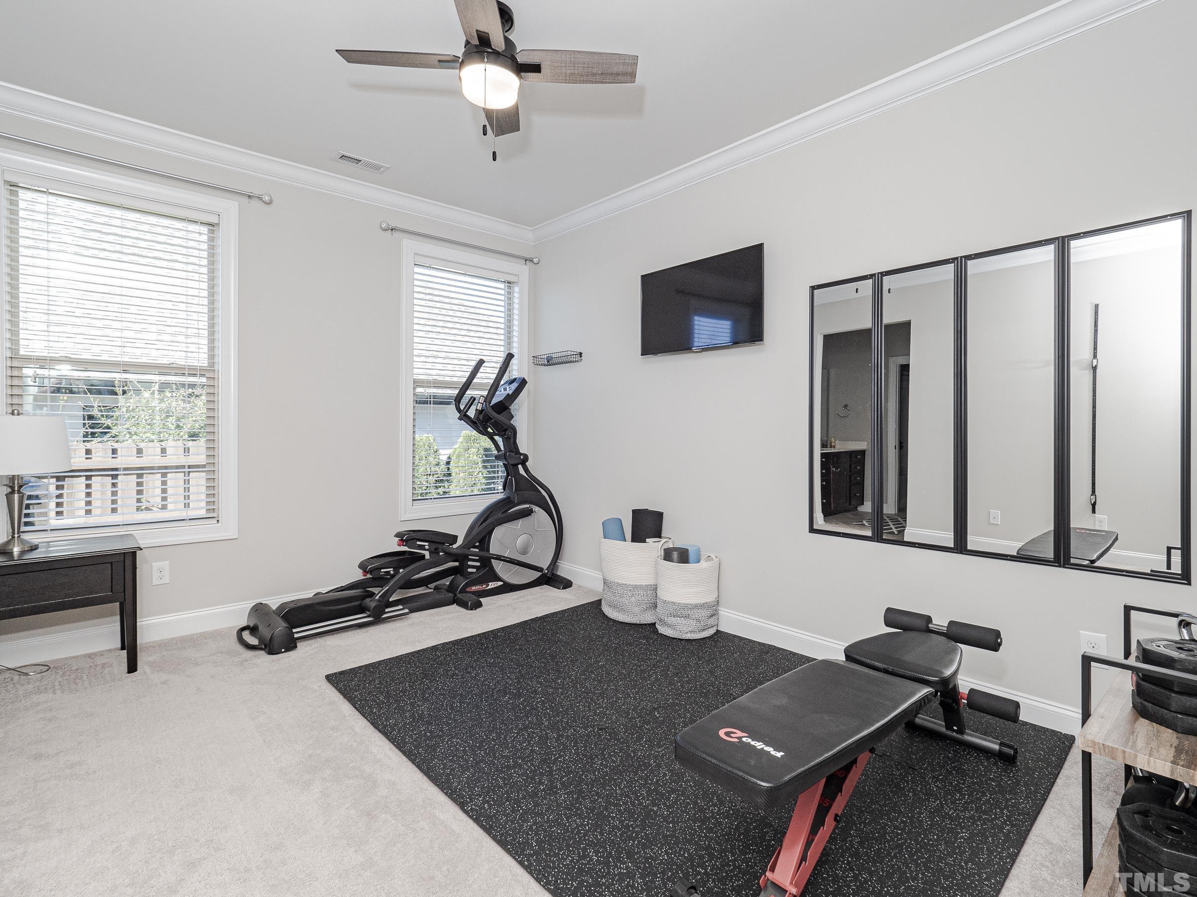 1303 Capstone Drive Durham, NC 27713 - Photo 18 of 27 a view of a workspace with furniture and a window