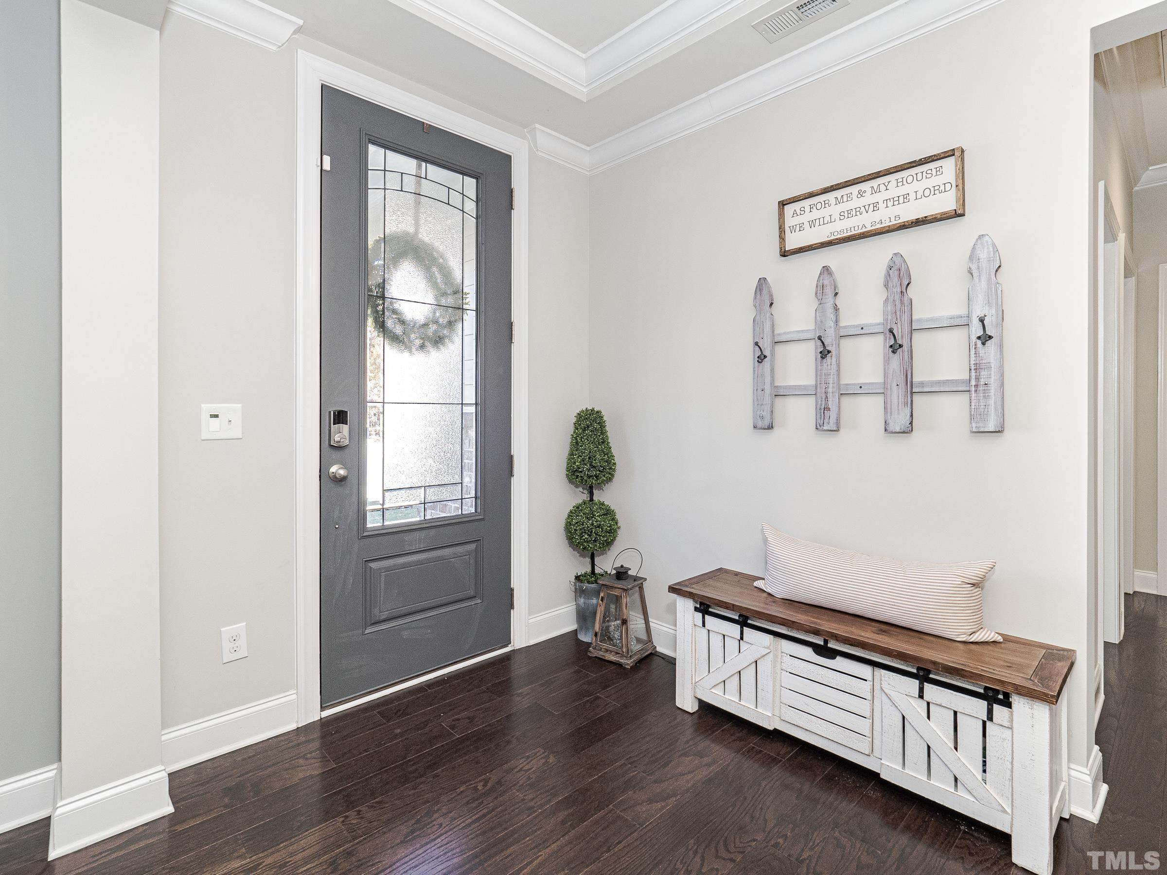 1303 Capstone Drive Durham, NC 27713 - Photo 3 of 27 a living room with furniture and wooden floor