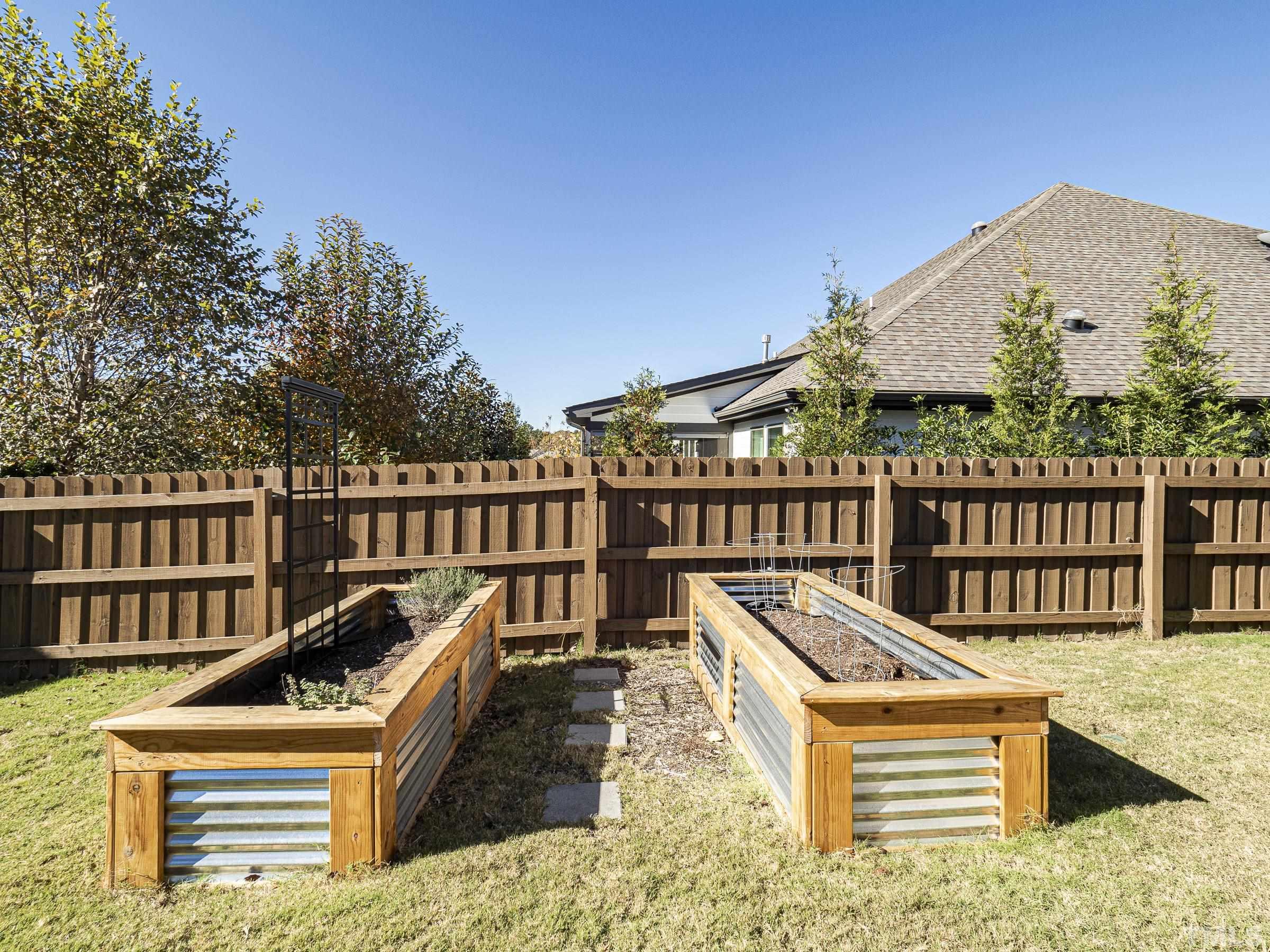 1303 Capstone Drive Durham, NC 27713 - Photo 24 of 27 a view of a house with pool and deck