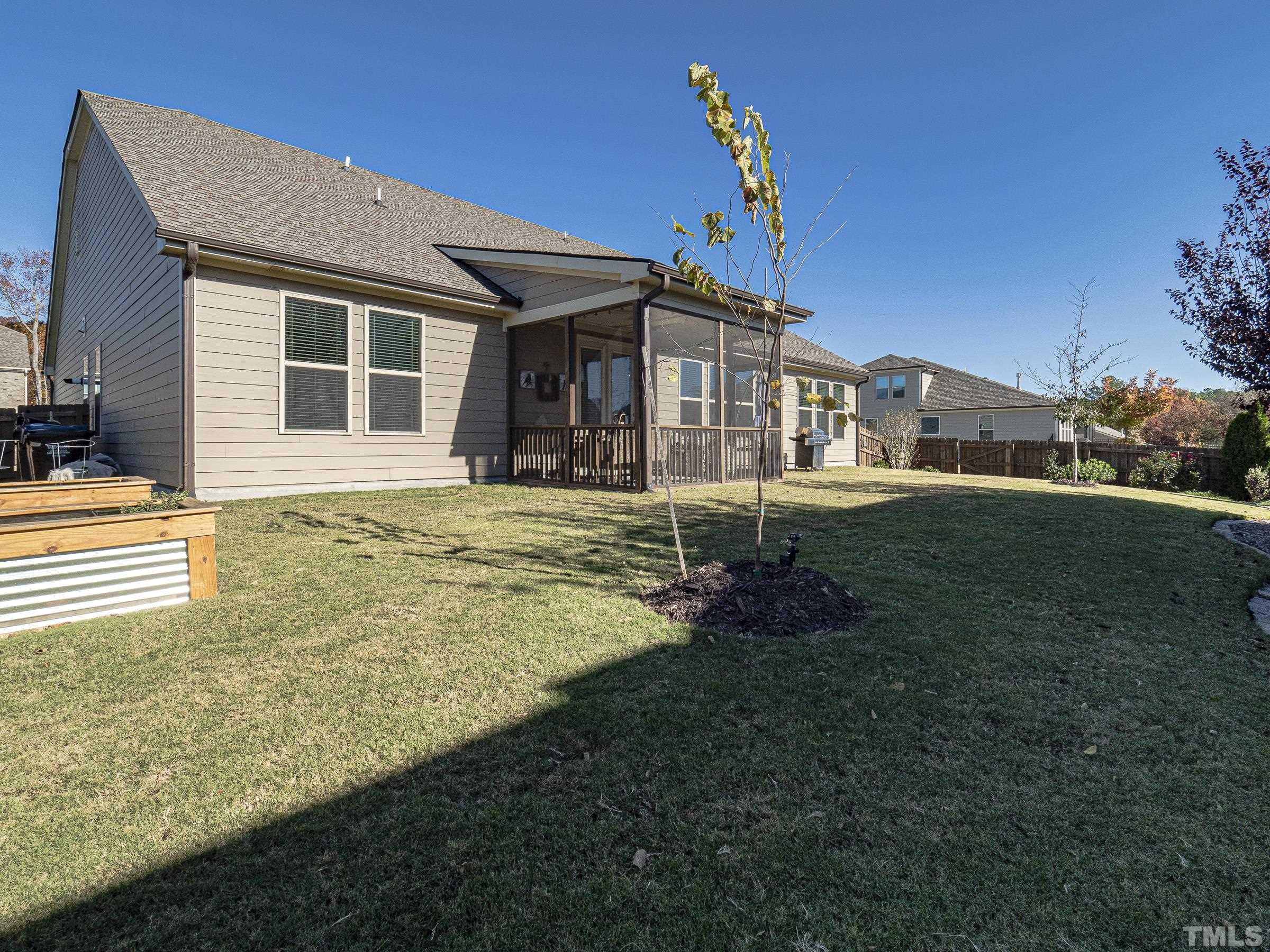 1303 Capstone Drive Durham, NC 27713 - Photo 26 of 27 a house view with a garden space