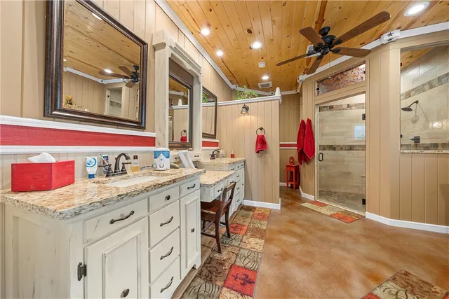 a bedroom with a bed and a fireplace