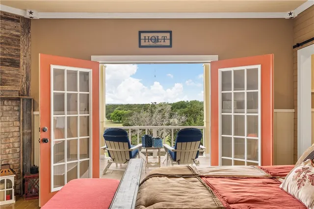 a view of a backyard with sitting area