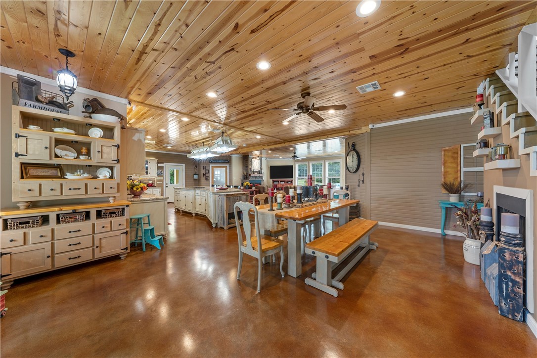 655 Highway 236 Moody, TX 76557 - Photo 3 of 60 a room with lots of wooden furniture and a chandelier