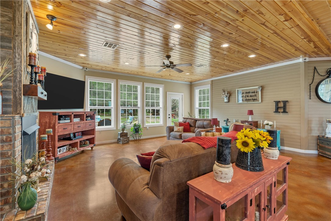 655 Highway 236 Moody, TX 76557 - Photo 10 of 60 a living room with fireplace furniture and a flat screen tv