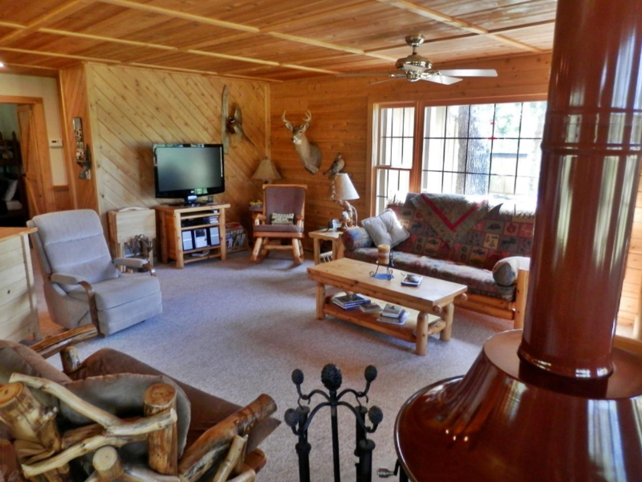 841 11 Mile Road Irons, MI 49644 - Photo 10 of 38 Fireplace looking into living room