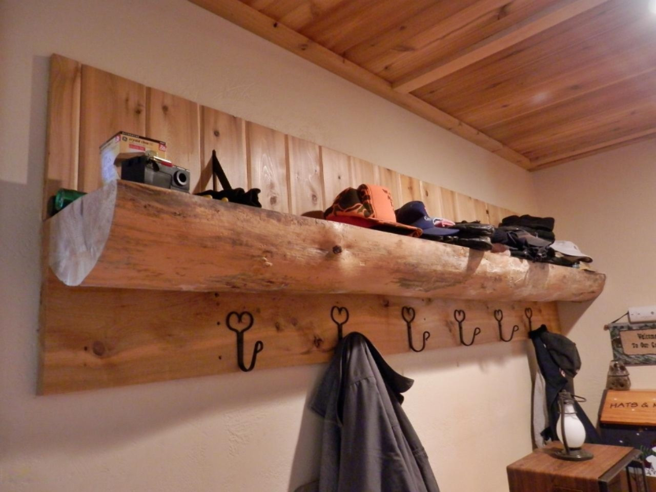 841 11 Mile Road Irons, MI 49644 - Photo 16 of 38 Log shelf and coat hooks in foyer