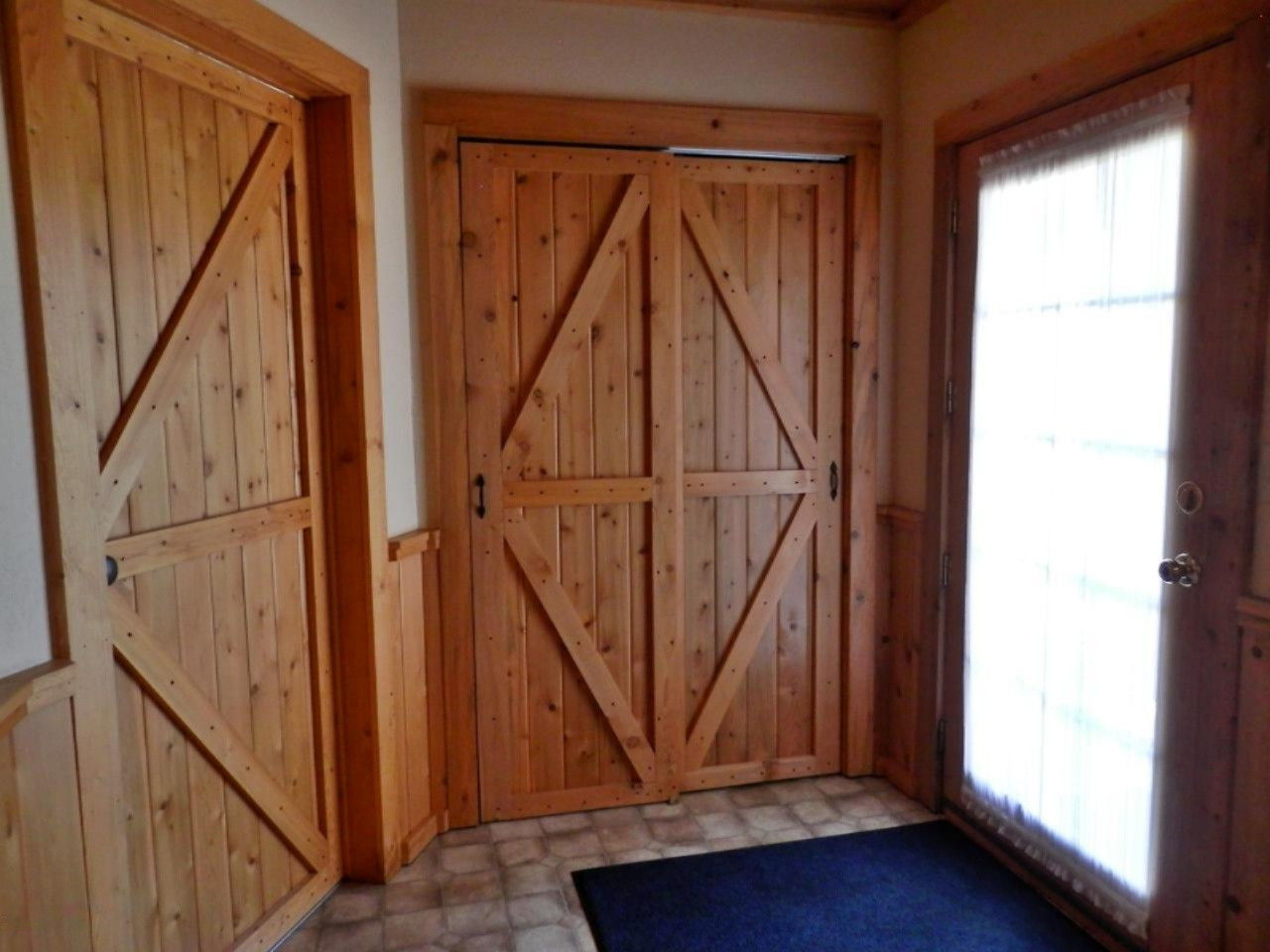 841 11 Mile Road Irons, MI 49644 - Photo 17 of 38 Amazing hand made doors throughout
