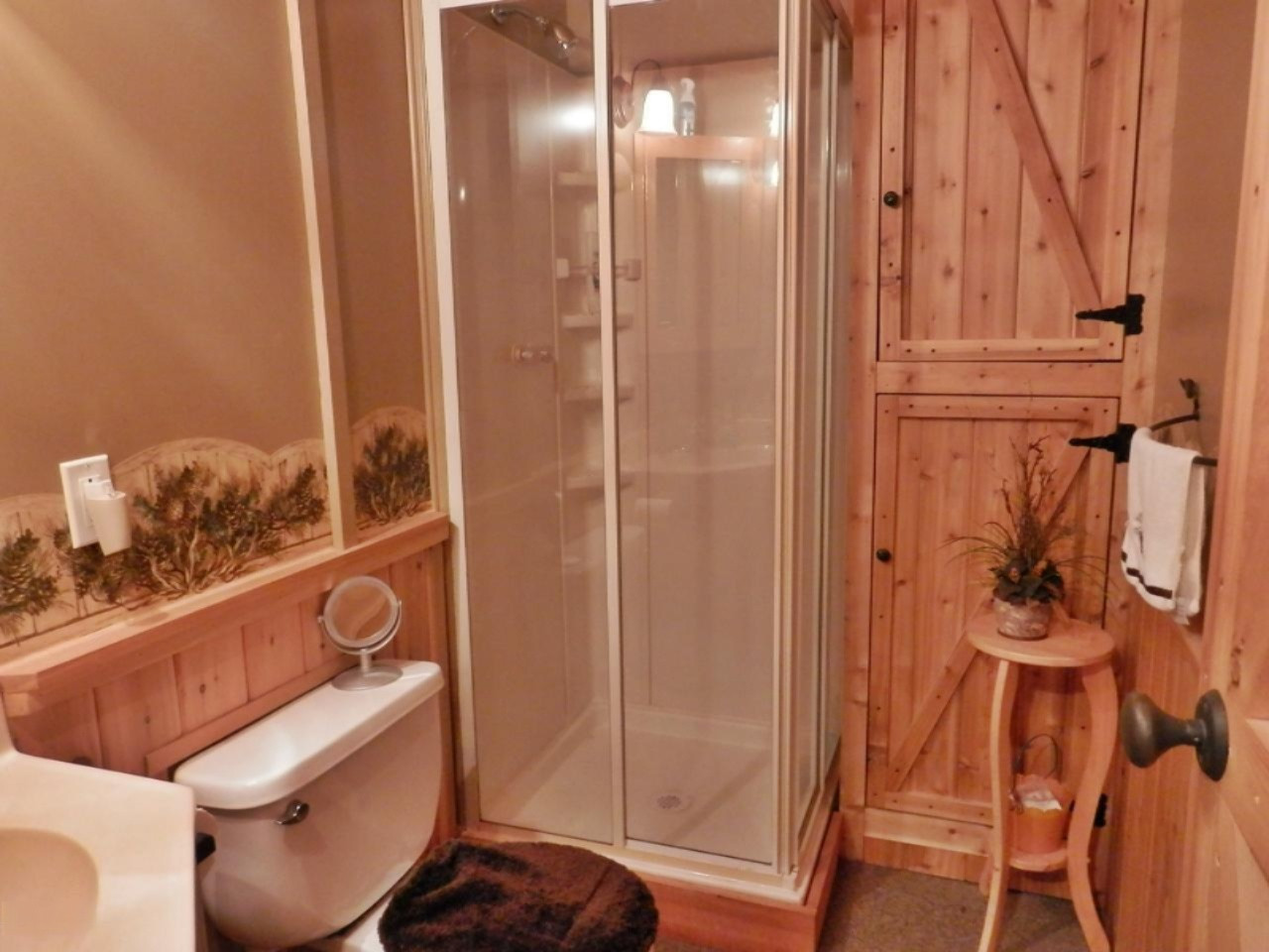 841 11 Mile Road Irons, MI 49644 - Photo 20 of 38 Full hall bath with linen storage