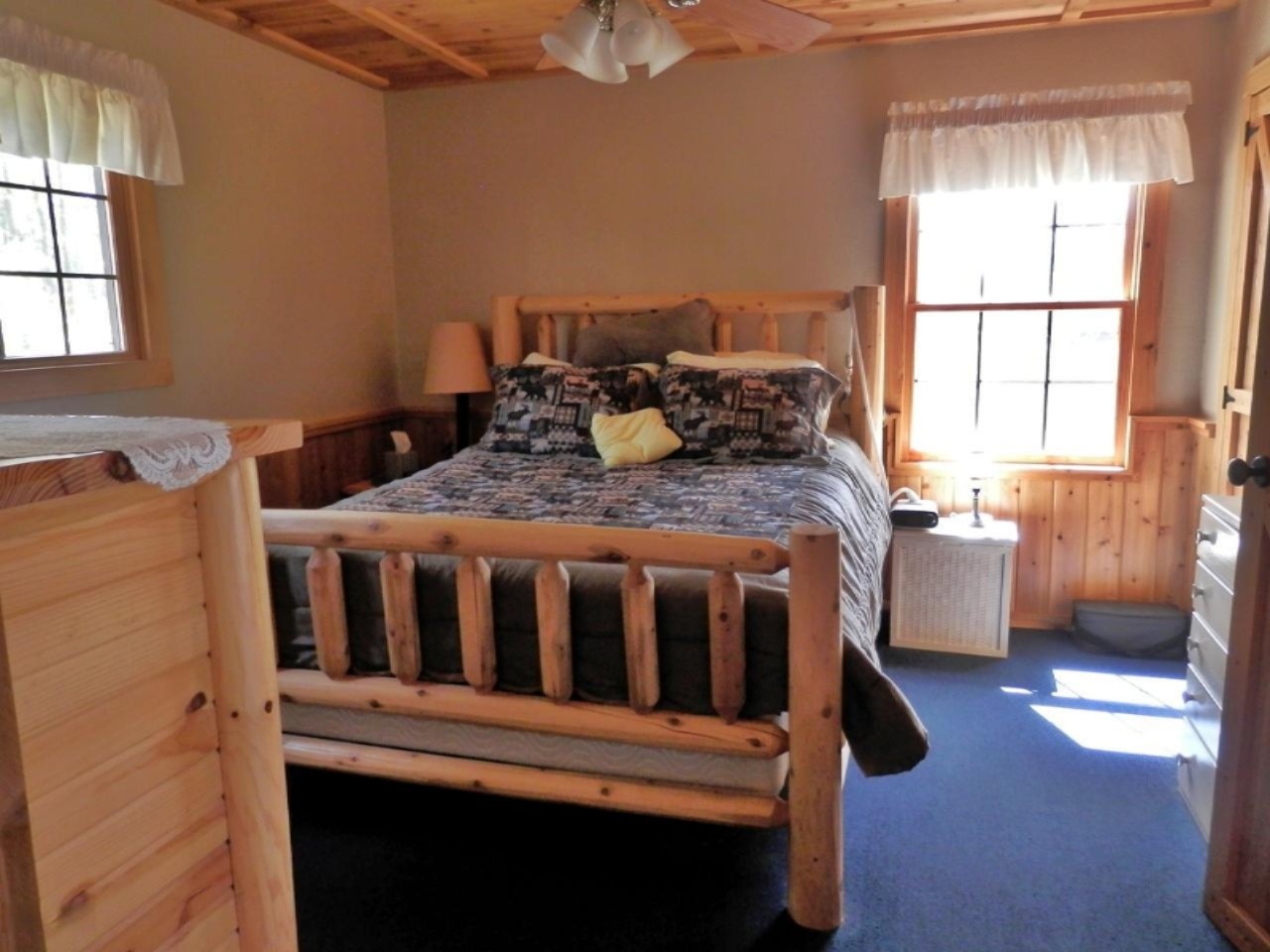 841 11 Mile Road Irons, MI 49644 - Photo 22 of 38 Master bedroom