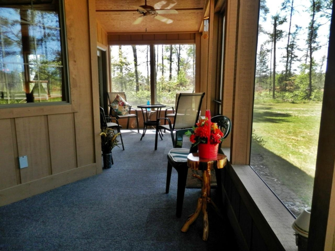 841 11 Mile Road Irons, MI 49644 - Photo 5 of 38 Wide open view from screened porch