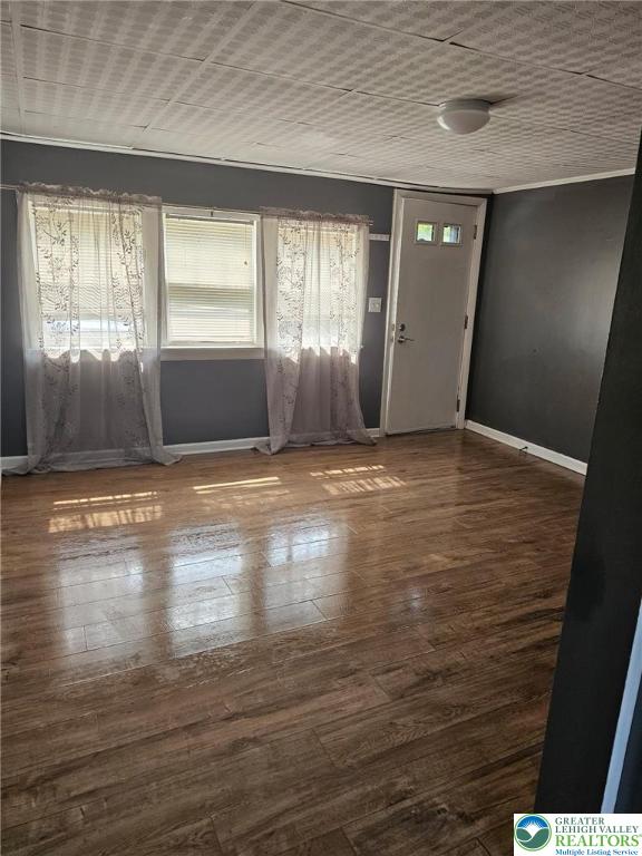 500 Hall Road Nazareth, PA 18064 - Photo 13 of 33 an empty room with wooden floor and windows