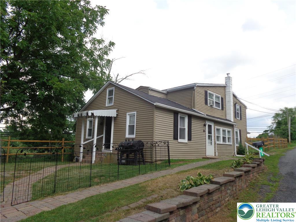 500 Hall Road Nazareth, PA 18064 - Photo 4 of 33 a front view of a house with a yard