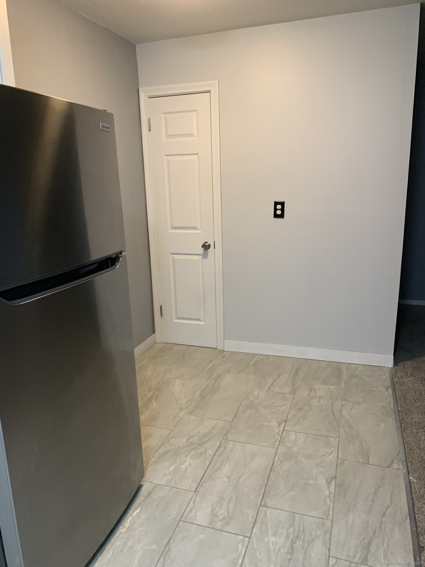 507 Emmett Street, Unit 13 Bristol, CT 06010 - Photo 8 of 16 a view of an empty room