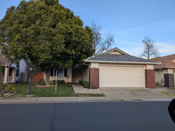 front view of a house with a street