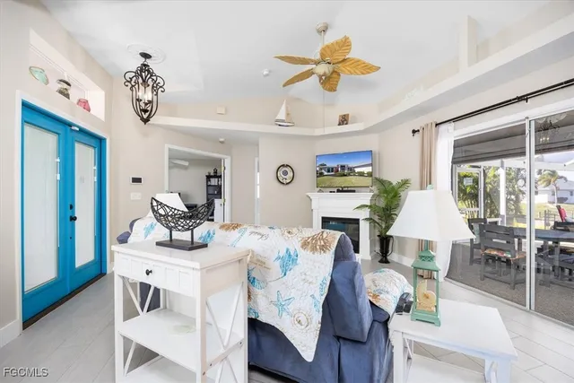 a view of a dining room with furniture wooden floor and chandelier