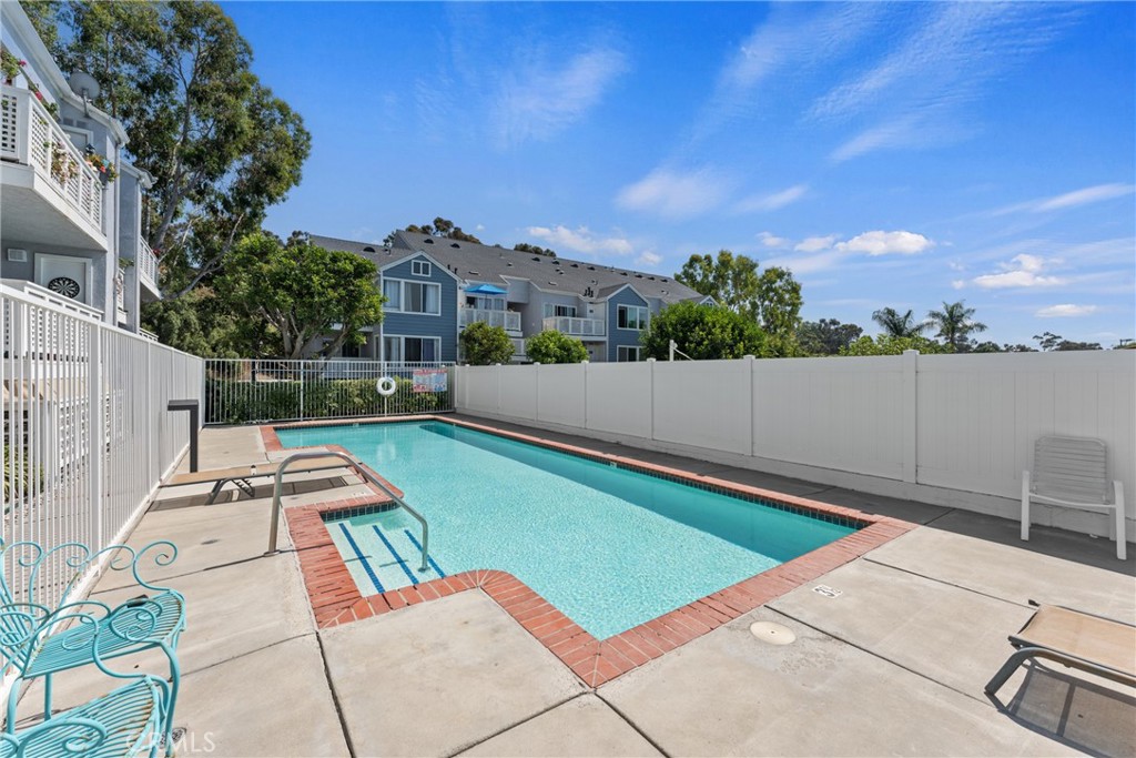 34264 Camino Capistrano, Unit 102 Dana Point, CA 92624 - Photo 30 of 37 an outdoor space with pool and furniture