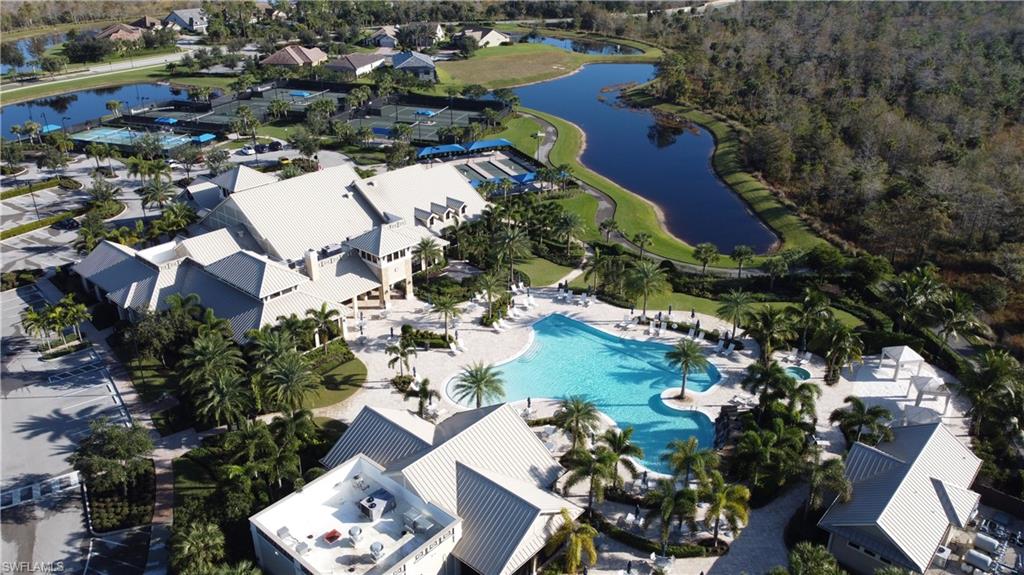 6848 Winding Cypress Drive Naples, FL 34114 - Photo 36 of 47 an aerial view of residential houses with outdoor space