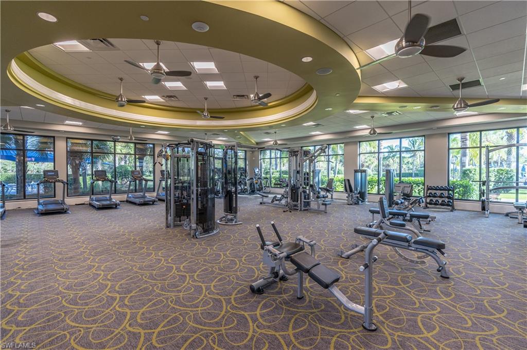 6848 Winding Cypress Drive Naples, FL 34114 - Photo 39 of 47 a view of a room with gym equipment