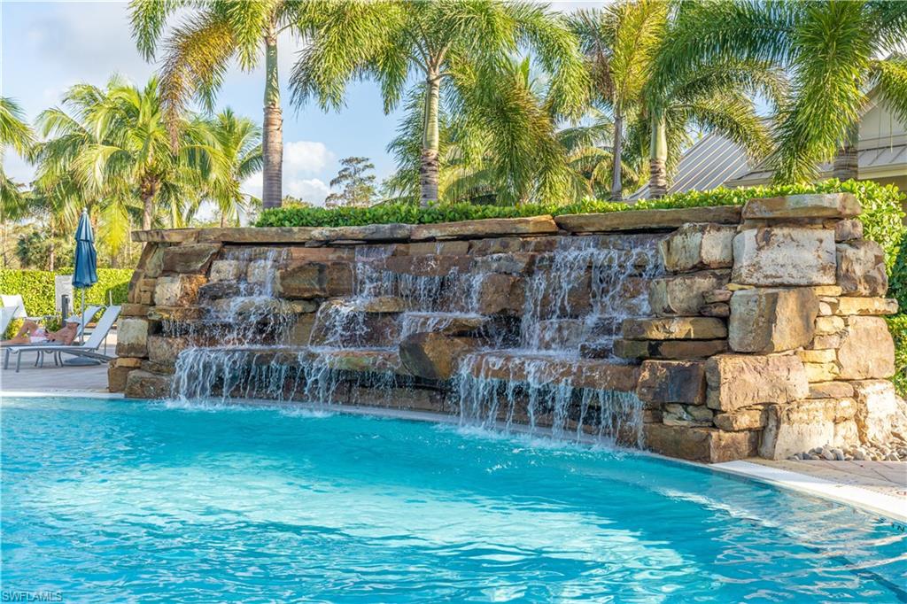 6848 Winding Cypress Drive Naples, FL 34114 - Photo 40 of 47 a view of a chairs and table in patio