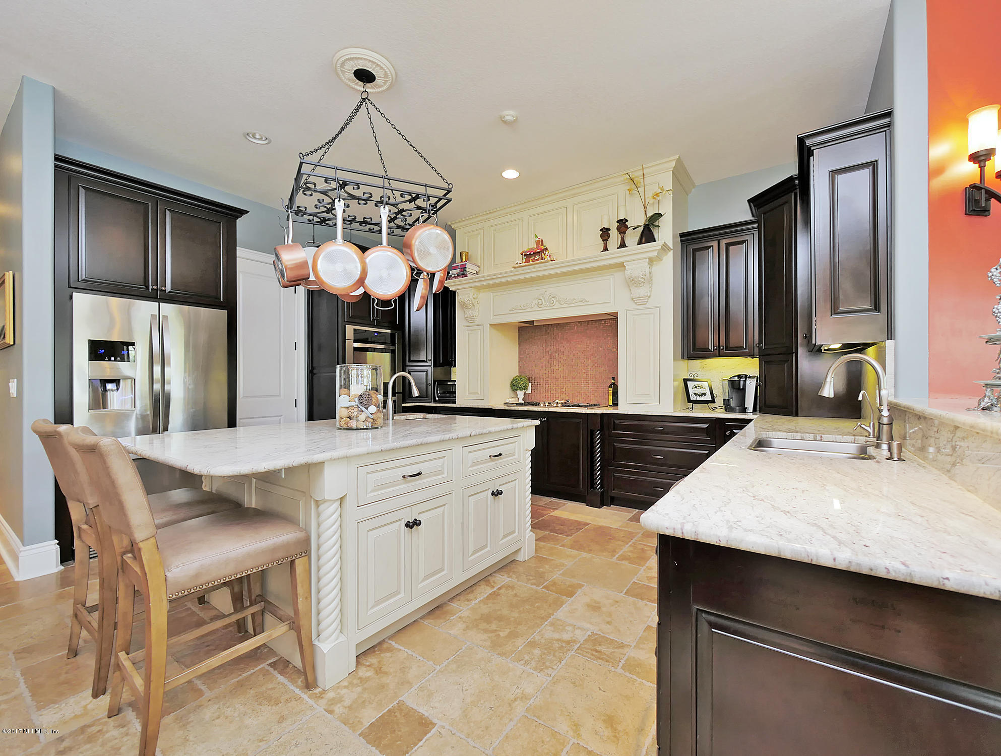 8074 Green Glade Road Jacksonville, FL 32256 - Photo 18 of 71 a kitchen with kitchen island granite countertop a sink a stove and a refrigerator