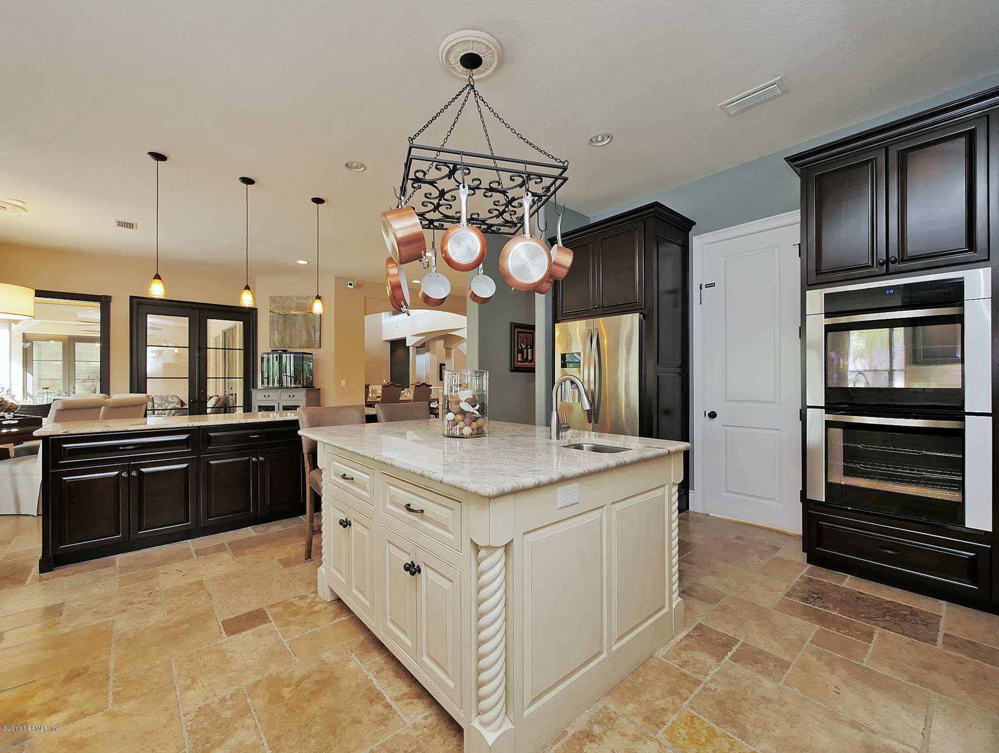 8074 Green Glade Road Jacksonville, FL 32256 - Photo 19 of 71 a kitchen with stainless steel appliances granite countertop a stove and cabinets