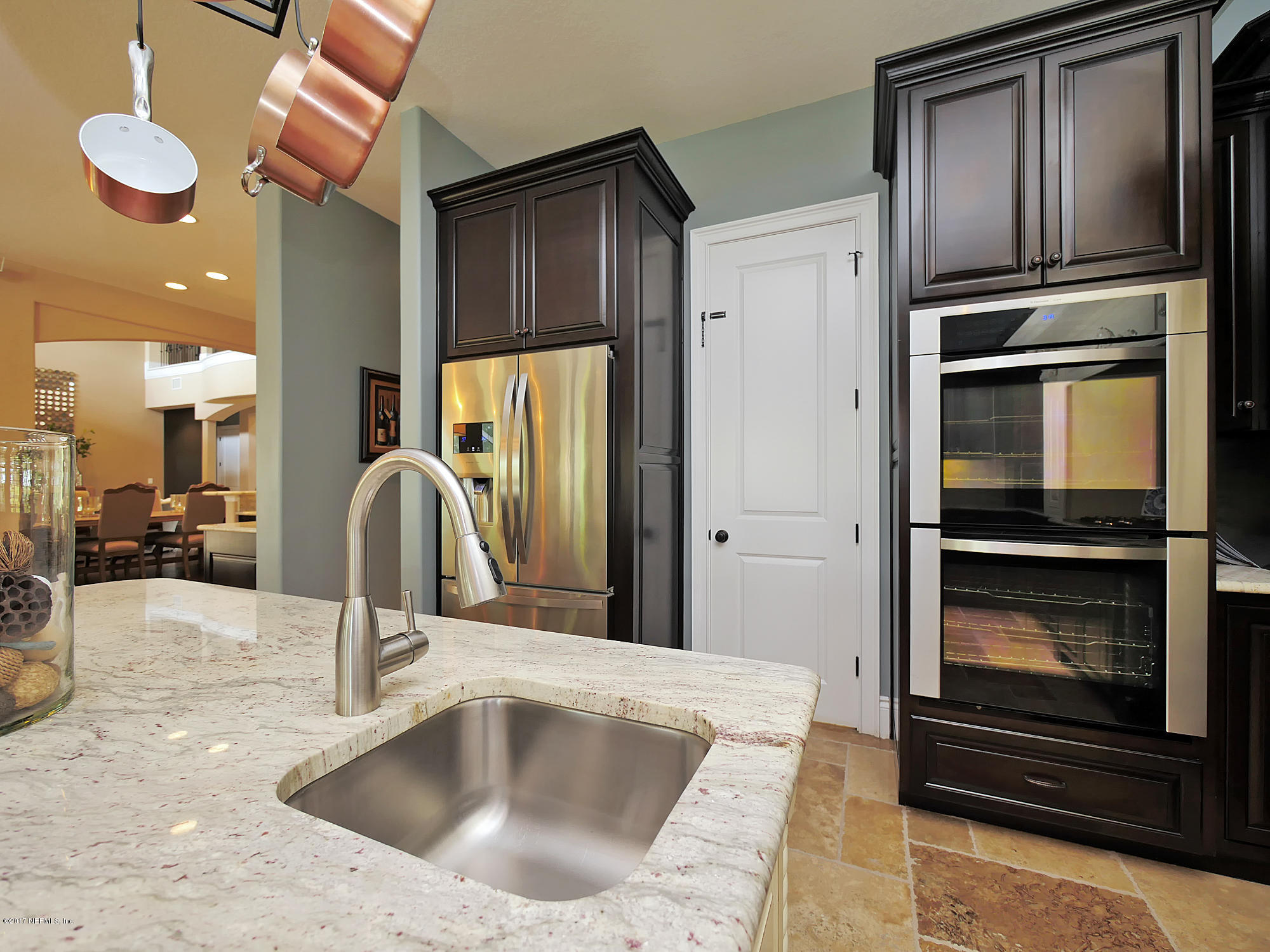 8074 Green Glade Road Jacksonville, FL 32256 - Photo 20 of 71 a kitchen with stainless steel appliances granite countertop a refrigerator and a sink