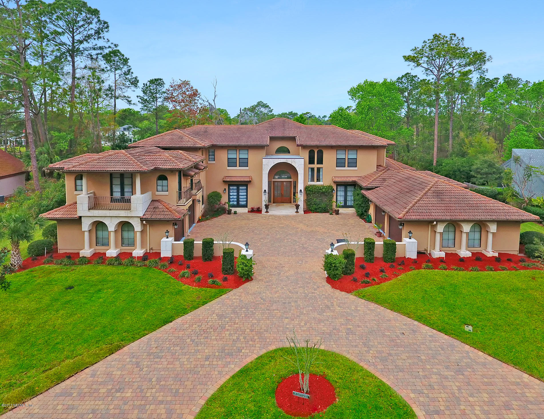 8074 Green Glade Road Jacksonville, FL 32256 - Photo 2 of 71 a front view of house with yard and green space