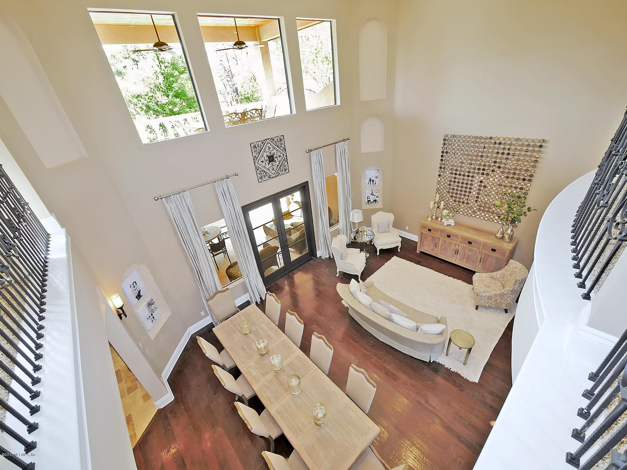 8074 Green Glade Road Jacksonville, FL 32256 - Photo 42 of 71 a living room with furniture and a large window