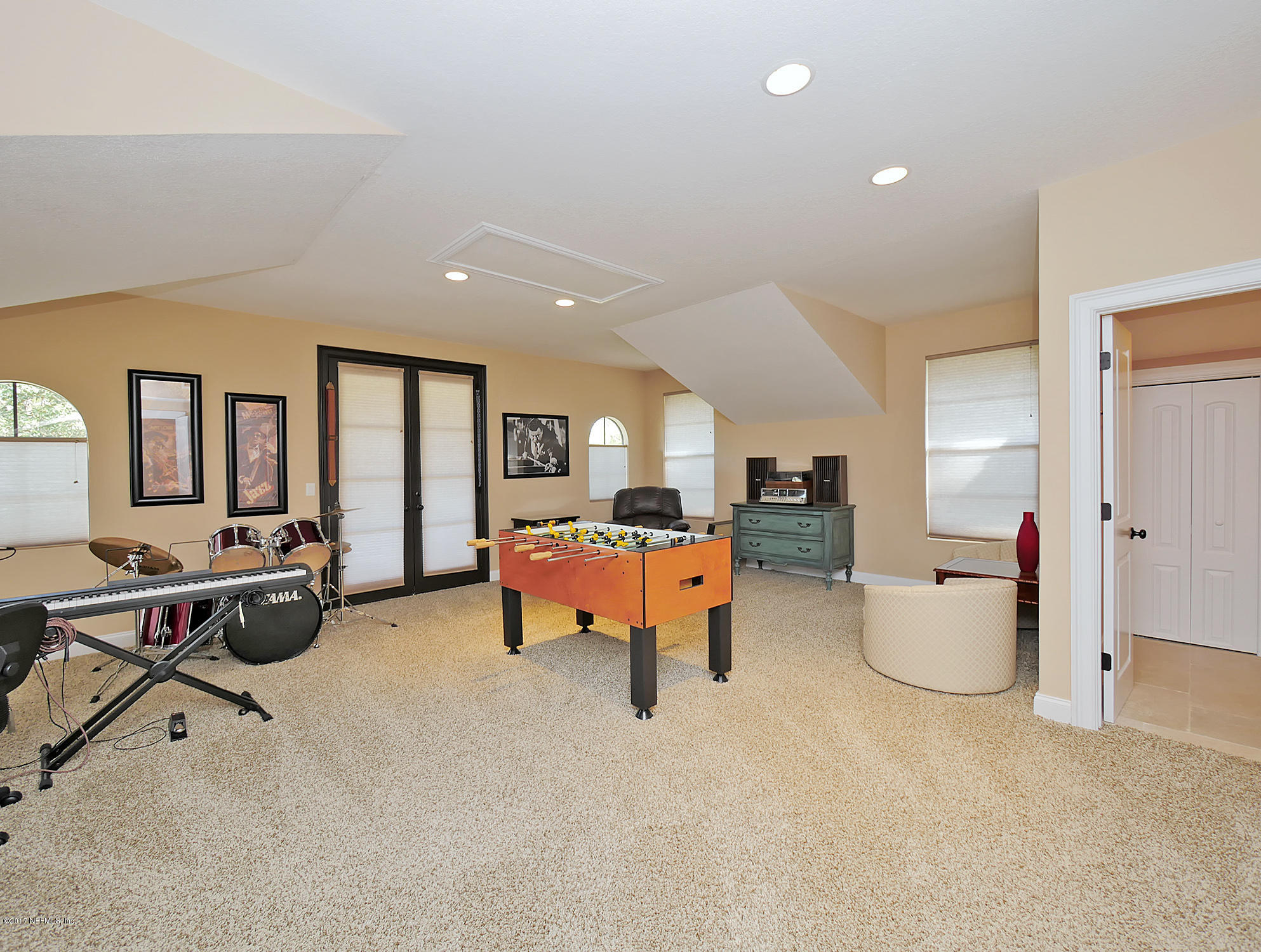 8074 Green Glade Road Jacksonville, FL 32256 - Photo 47 of 71 a living room with furniture and white walls