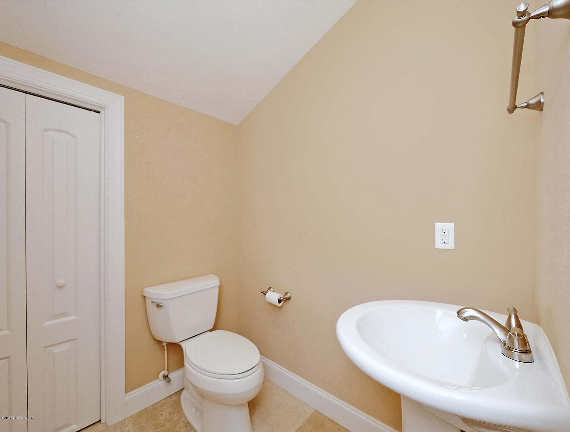 8074 Green Glade Road Jacksonville, FL 32256 - Photo 48 of 71 a bathroom with a toilet and a sink