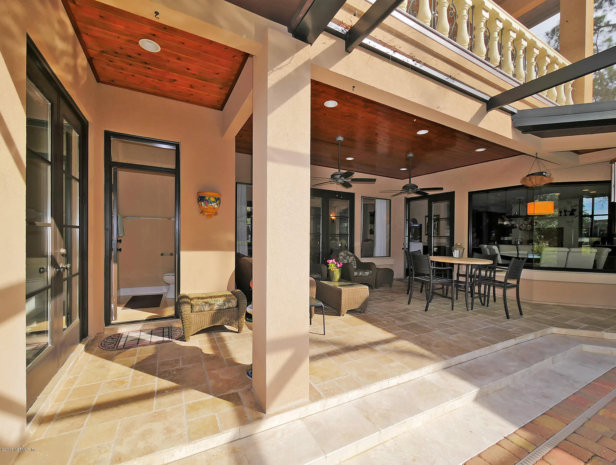 8074 Green Glade Road Jacksonville, FL 32256 - Photo 60 of 71 a view of a hall with living room and dining area