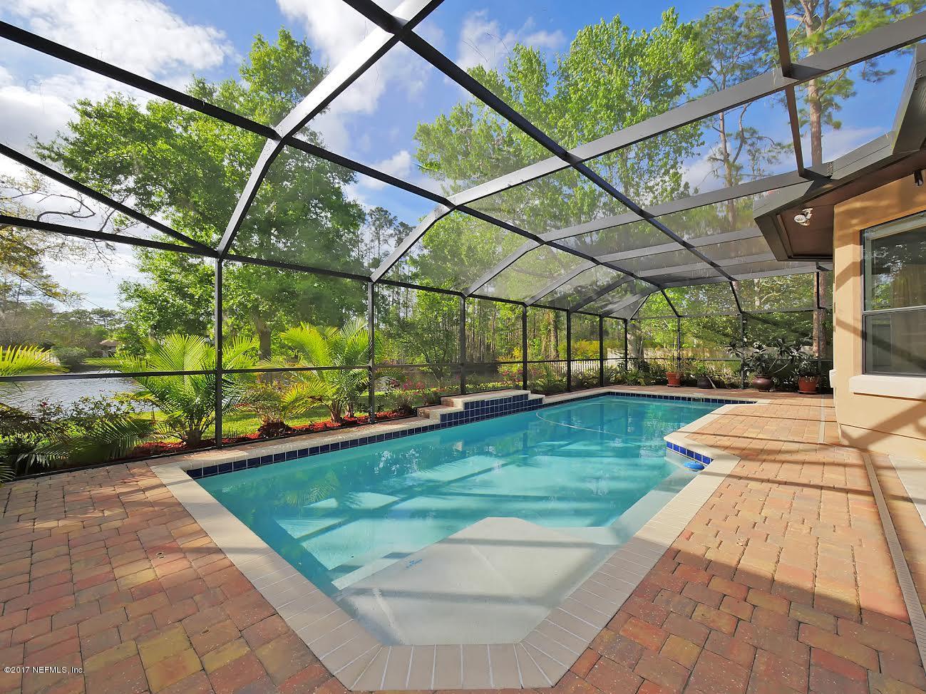 8074 Green Glade Road Jacksonville, FL 32256 - Photo 70 of 71 a view of a backyard with sitting area