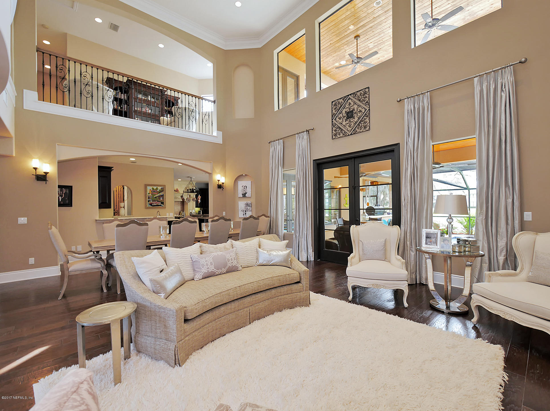 8074 Green Glade Road Jacksonville, FL 32256 - Photo 9 of 71 a living room with furniture and a large window