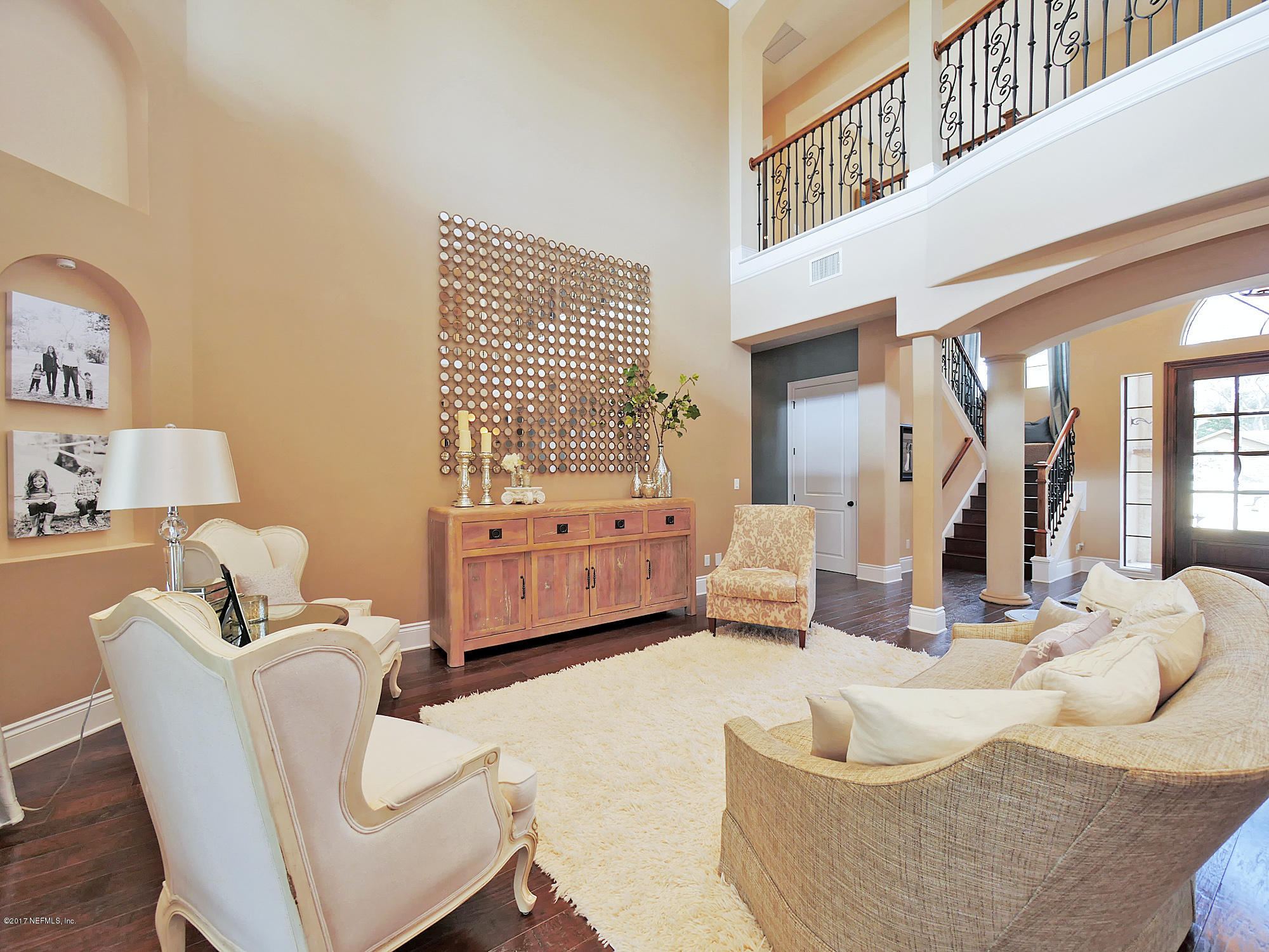 8074 Green Glade Road Jacksonville, FL 32256 - Photo 10 of 71 a living room with furniture and a large window