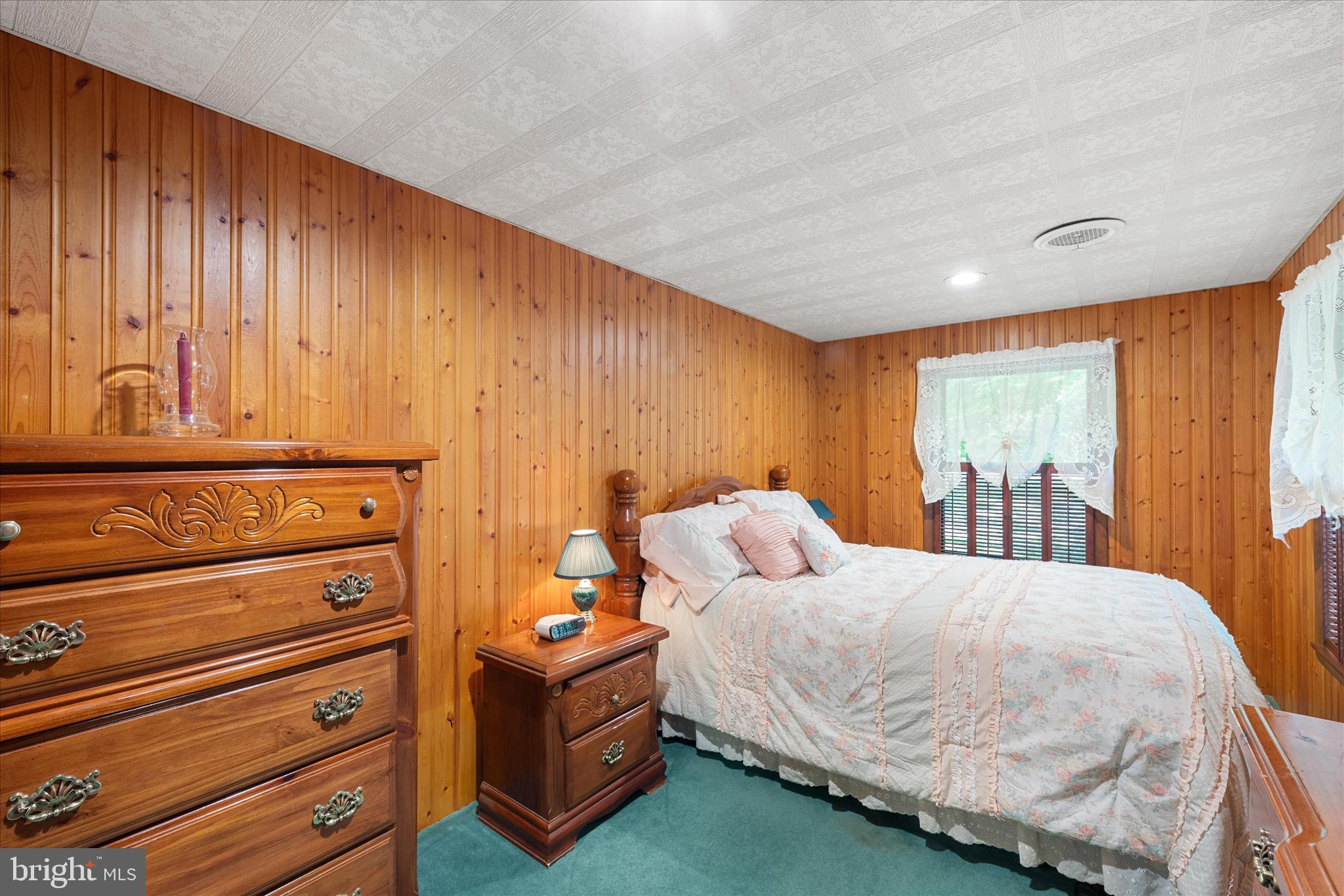 251 Rings End Road Millington, MD 21651 - Photo 21 of 47 a bedroom with a bed and a dresser