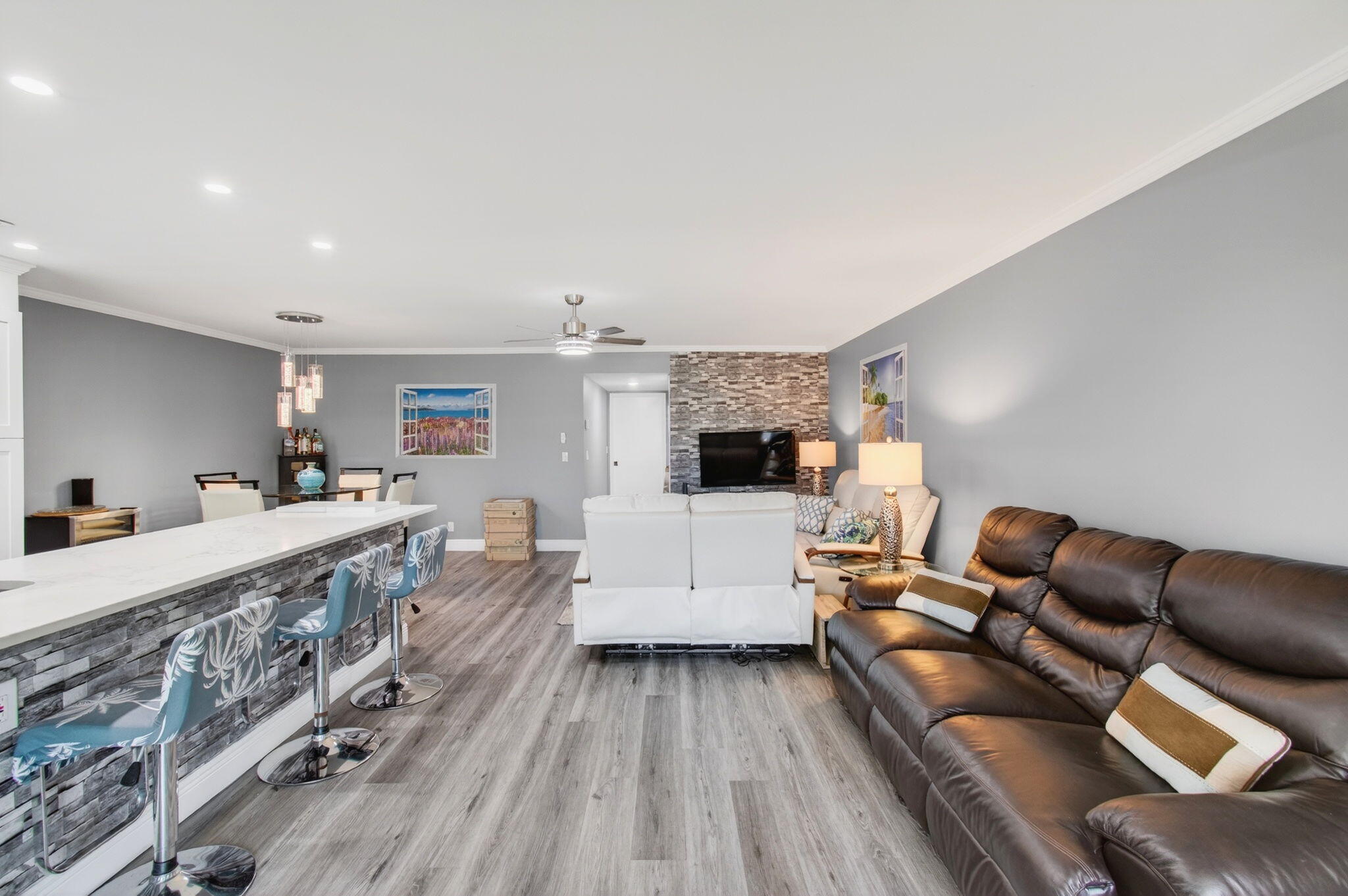 1320 High Point Place South, Unit C Delray Beach, FL 33445 - Photo 22 of 56 Open concept kitchen and living room vie