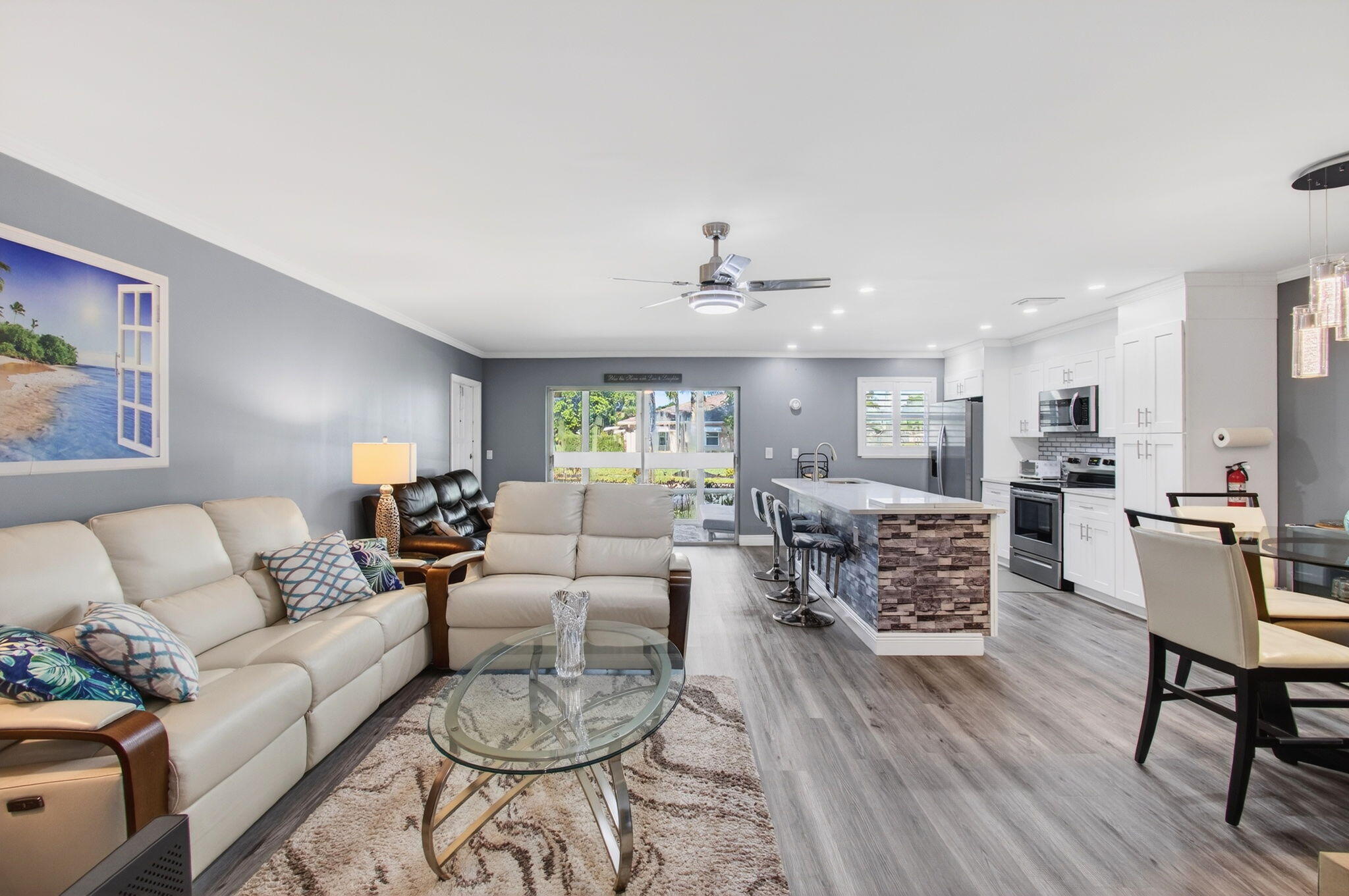1320 High Point Place South, Unit C Delray Beach, FL 33445 - Photo 23 of 56 Living kitchen and dining area view (2)