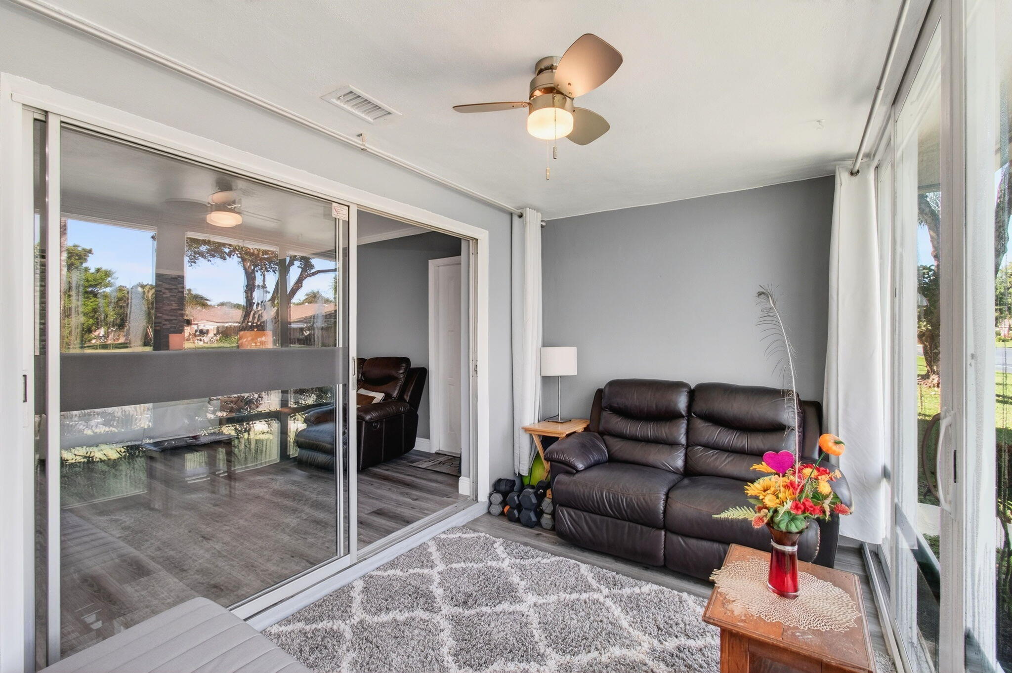 1320 High Point Place South, Unit C Delray Beach, FL 33445 - Photo 4 of 56 Enclosed Florida room (1)