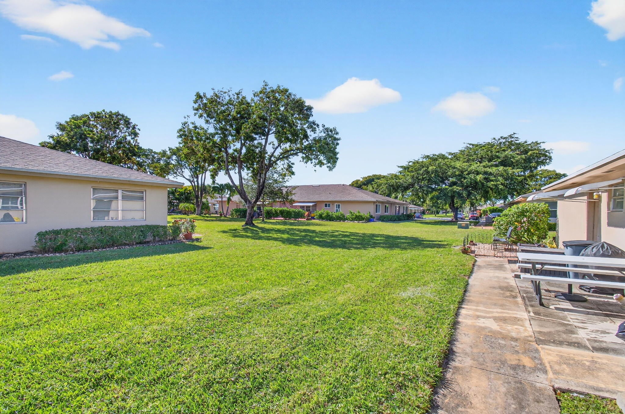 1320 High Point Place South, Unit C Delray Beach, FL 33445 - Photo 42 of 56 Back yard view (3)