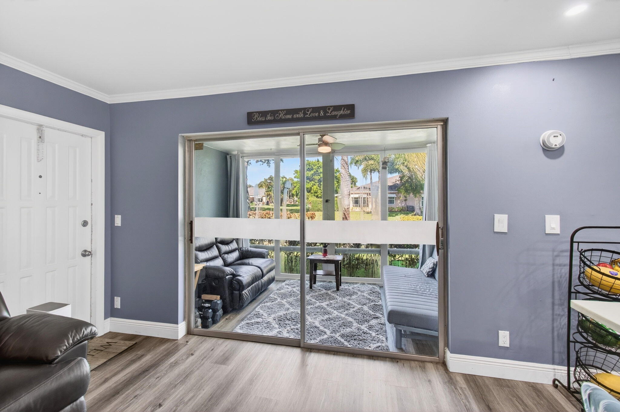 1320 High Point Place South, Unit C Delray Beach, FL 33445 - Photo 9 of 56 Enclosed Florida room under air (1)