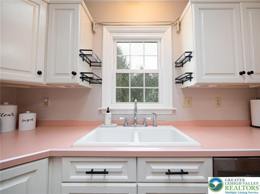 3217 Garfield Avenue, Unit E Reading, PA 19605 - Photo 18 of 45 a bathroom with a sink and a window