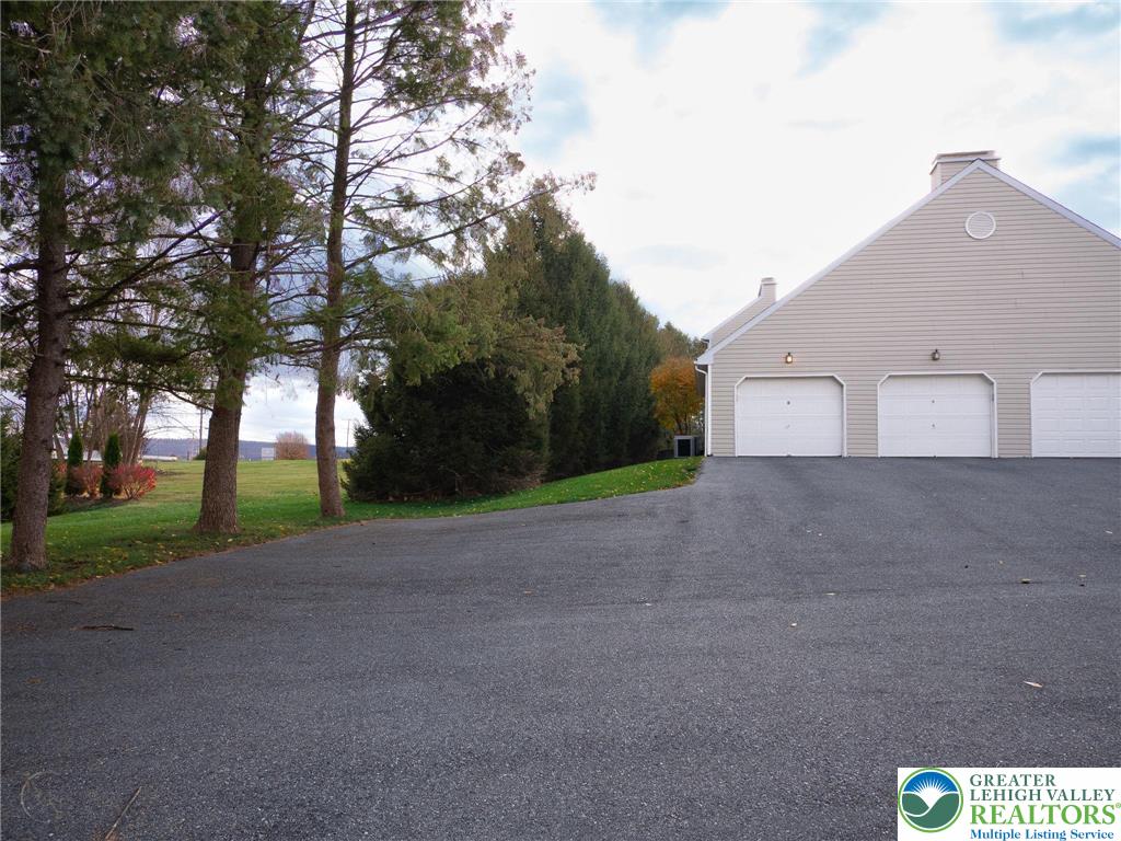3217 Garfield Avenue, Unit E Reading, PA 19605 - Photo 37 of 45 a view of a house with a yard