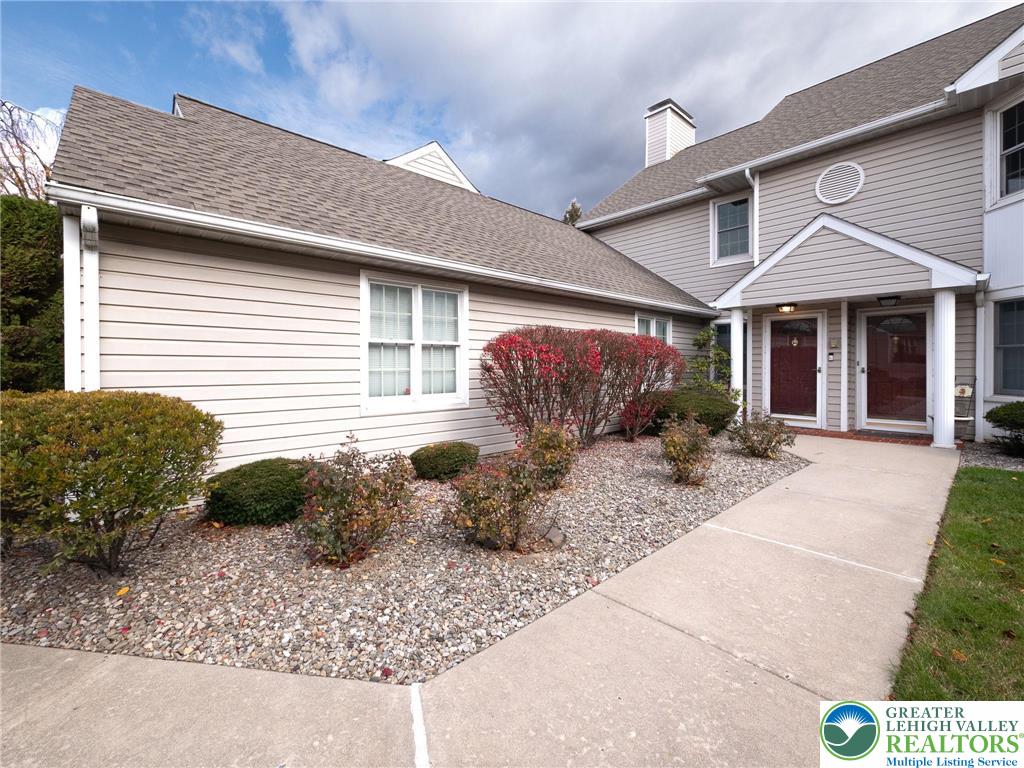3217 Garfield Avenue, Unit E Reading, PA 19605 - Photo 40 of 45 a front view of a house with garden