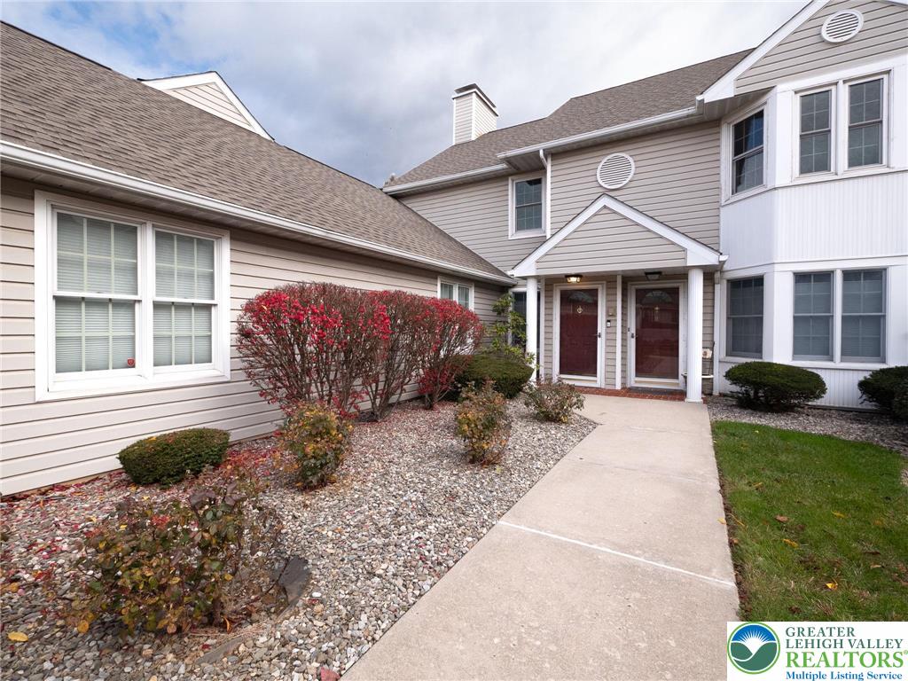 3217 Garfield Avenue, Unit E Reading, PA 19605 - Photo 41 of 45 a front view of a house with garden