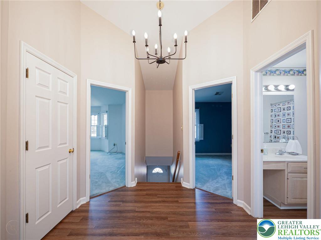 3217 Garfield Avenue, Unit E Reading, PA 19605 - Photo 6 of 45 a view of a room with wooden floor and kitchen view