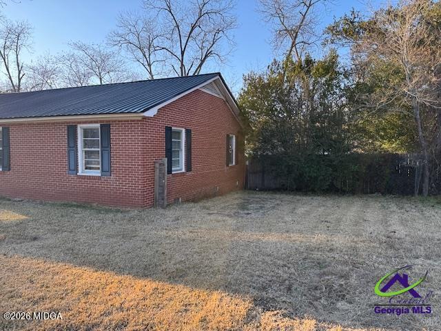 151 Edmondson Circle Cochran, GA 31014 - Photo 11 of 16 a backyard of a house with lots of green space